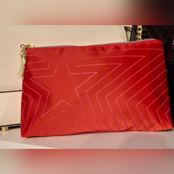 Clinique Handbags - Clinique Red Star-Print Satin Cosmetics Makeup Bag NWOT